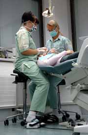 Dentists and Dental Assistant using the Salli Saddle Chair